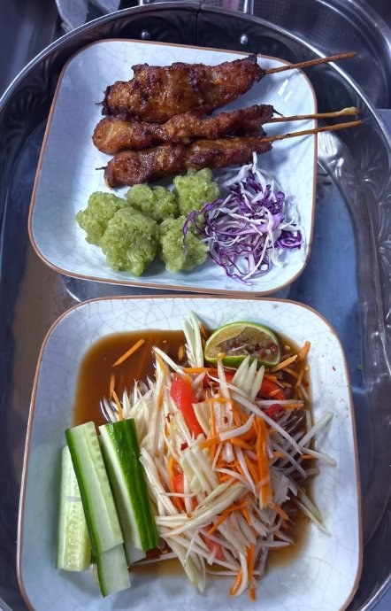 Pork satay skewers and Som Tam papaya salad